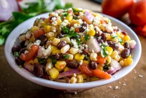 This wildly versatile Black Bean and Corn Salsa will have you dreaming up all sorts of ways to use it: tacos, salads, even wraps! I think it tastes best when the lime flavor is at the forefront so feel to add another squeeze! mexicanplease.com