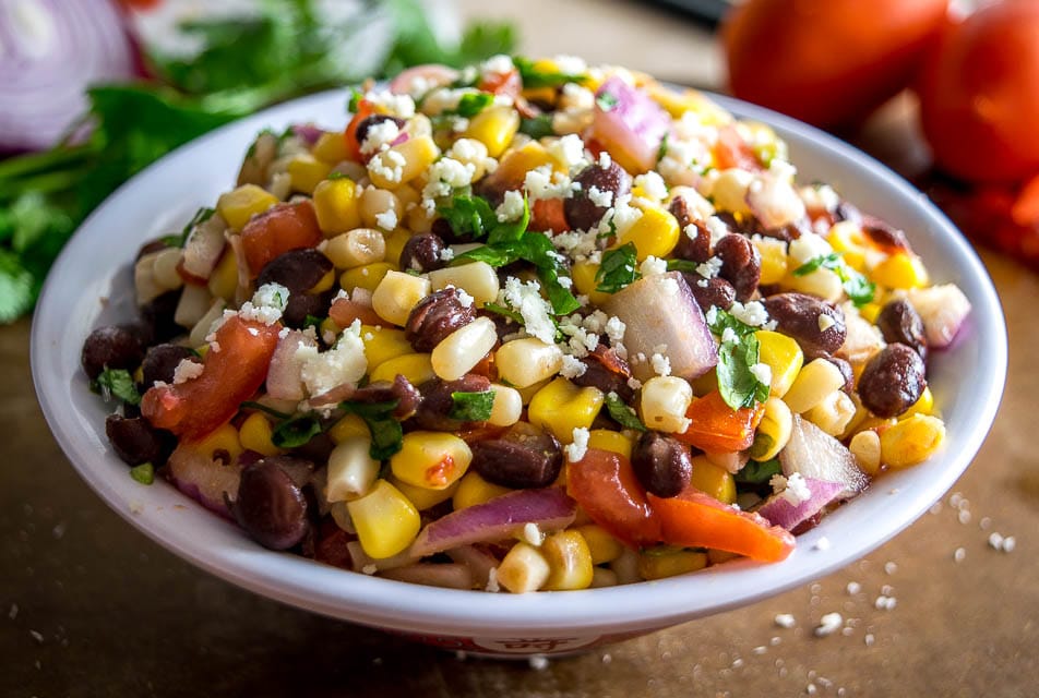 This wildly versatile Black Bean and Corn Salsa will have you dreaming up all sorts of ways to use it: tacos, salads, even wraps! I think it tastes best when the lime flavor is at the forefront so feel free to add another squeeze! mexicanplease.com