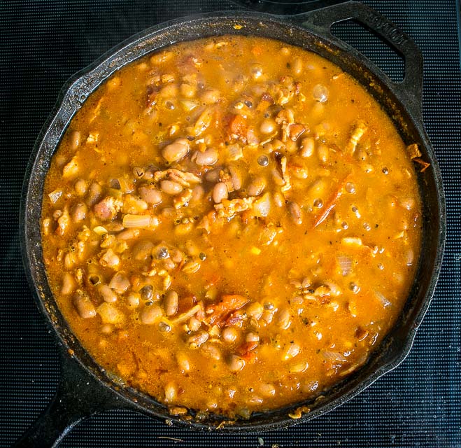 Charro Beans! You won't find a heartier, more delicious batch of beans anywhere in Mexico. This version uses bacon and chipotles but feel free to add in some chorizo if you have it. So good! mexicanplease.com