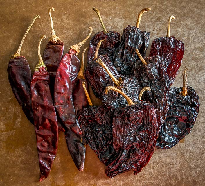 Ancho and Guajillo chili peppers turn this authentic adobo sauce into a flavorbomb! Use it to season meats or liquefy it for all sorts of stews -- so good! mexicanplease.com