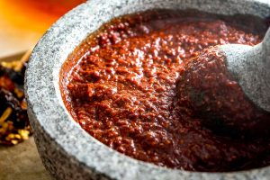 Ancho and Guajillo chili peppers turn this authentic adobo sauce into a flavorbomb! Use it to season meats or liquefy it for all sorts of stews -- so good! mexicanplease.com