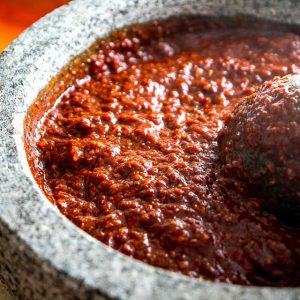 Ancho and Guajillo chili peppers turn this authentic adobo sauce into a flavorbomb! Use it to season meats or liquefy it for all sorts of stews -- so good! mexicanplease.com