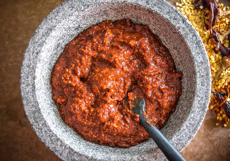 Ancho and Guajillo chili peppers turn this authentic adobo sauce into a flavorbomb! Use it to season meats or liquefy it for all sorts of stews -- so good! mexicanplease.com 