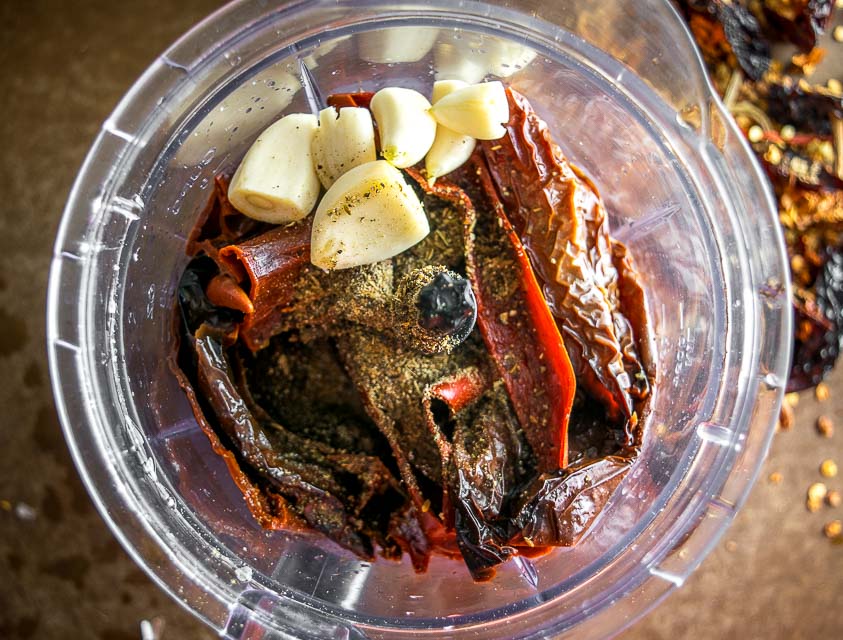 Ancho and Guajillo chili peppers turn this authentic adobo sauce into a flavorbomb! Use it to season meats or liquefy it for all sorts of stews -- so good! mexicanplease.com 