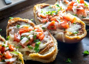 You probably already have all the ingredients you need for these Molletes (Mexican Bean and Cheese Sandwiches). Try them with some freshly made Pico de Gallo -- so good! mexicanplease.com