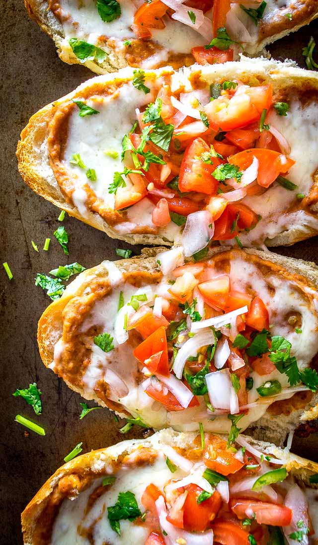 You probably already have all the ingredients you need for these Molletes (Mexican Bean and Cheese Sandwiches). Try them with some freshly made Pico de Gallo -- so good! mexicanplease.com