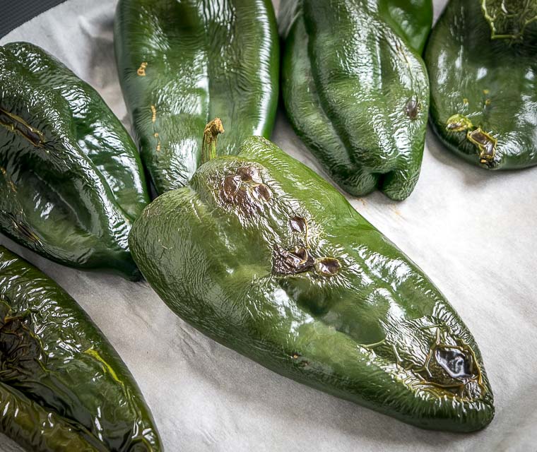 Finally a Rajas recipe! Roasted poblano strips swimming in a creamy sauce makes the perfect side dish. I add potatoes and some stock to turn it into a meal -- so good! mexicanplease.com