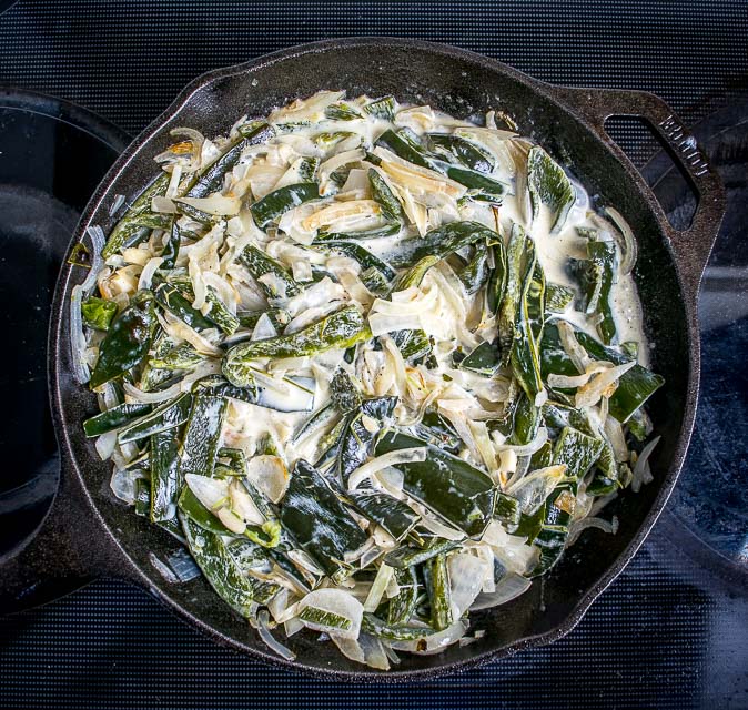 Finally a Rajas recipe! Roasted poblano strips swimming in a creamy sauce makes the perfect side dish. I add potatoes and some stock to turn it into a meal -- so good! mexicanplease.com