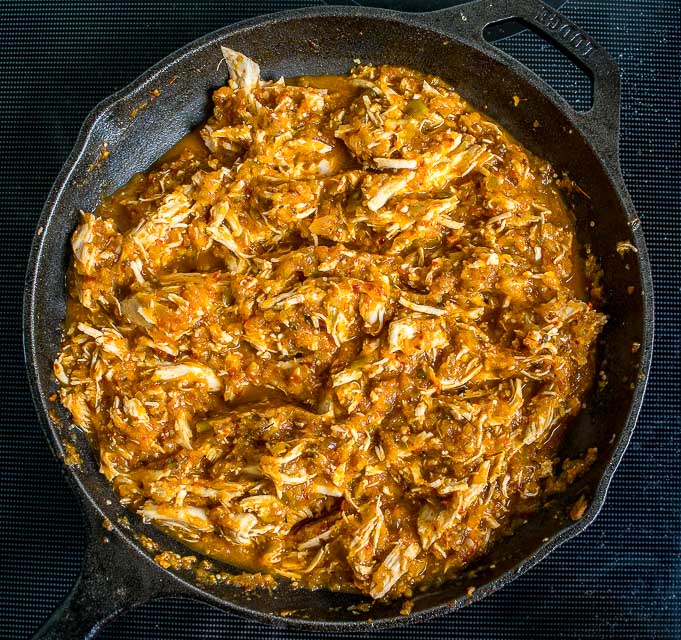 This is a delicious, fiery version of Chicken Tinga. The key is to use both tomatoes and tomatillos, along with plenty of chipotles! mexicanplease.com