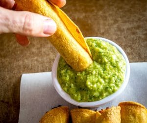 A few simple tricks will ensure you end up with a crispy batch of Chicken Flautas. We're serving them with a fiery Avocado Salsa Verde. So good! mexicanplease.com
