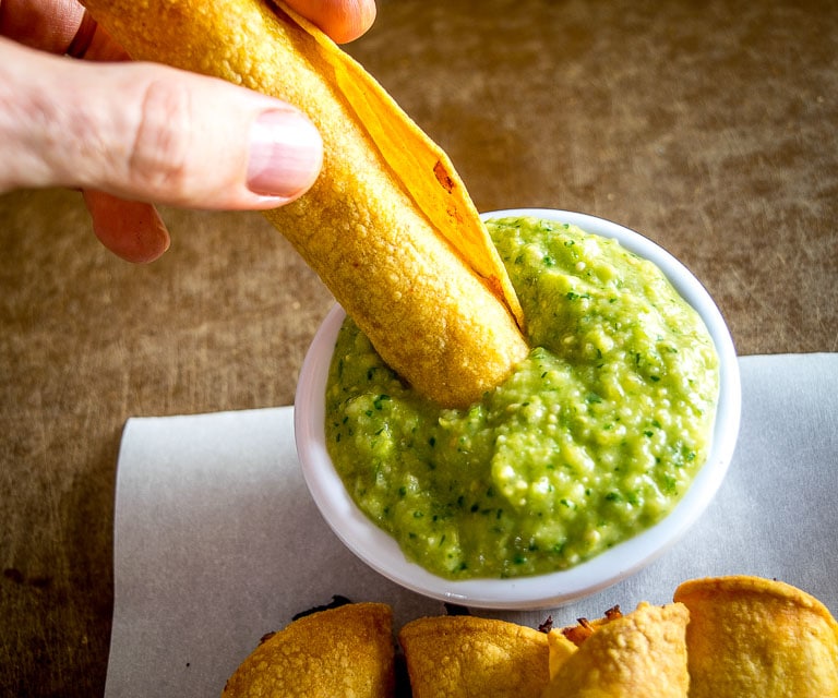 A few simple tricks will ensure you end up with a crispy batch of Chicken Flautas. We're serving them with a fiery Avocado Salsa Verde. So good! mexicanplease.com