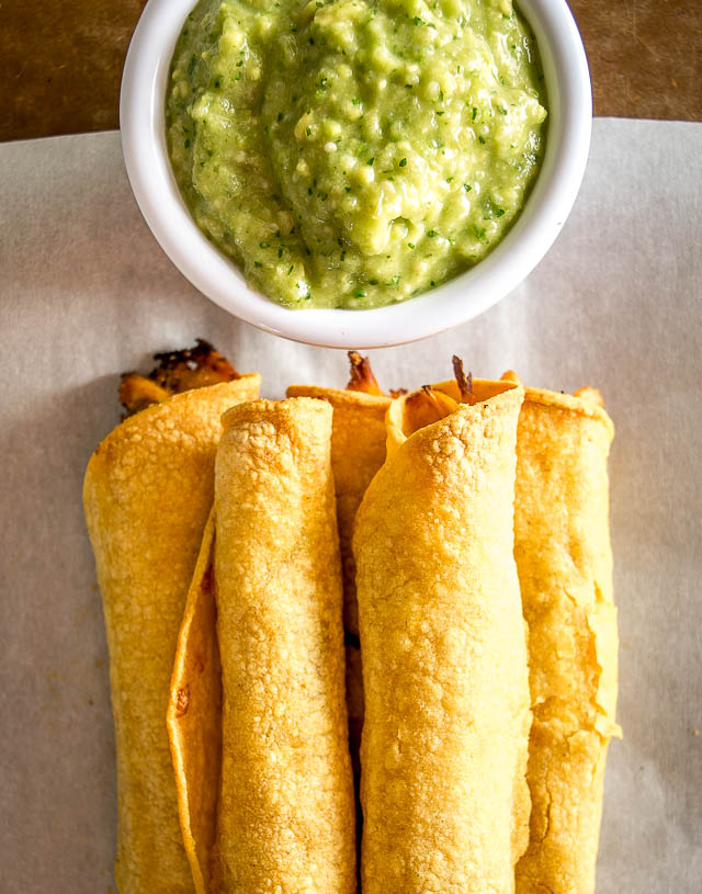 A few simple tricks will ensure you end up with a crispy batch of Chicken Flautas. We're serving them with a fiery Avocado Salsa Verde. So good! mexicanplease.com