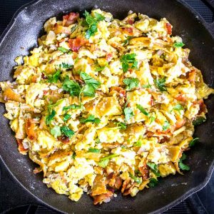 Migas are the perfect Mexican breakfast dish for lazy weekend mornings. We're topping this version with a freshly made Salsa Verde and it is delicious! mexicanplease.com