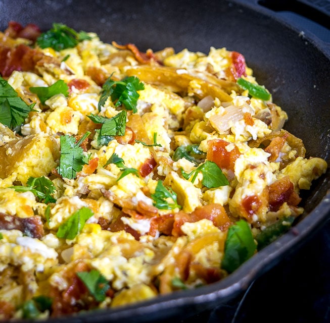 Migas are the perfect Mexican breakfast dish for lazy weekend mornings. We're topping this version with a freshly made Salsa Verde and it is delicious! mexicanplease.com 