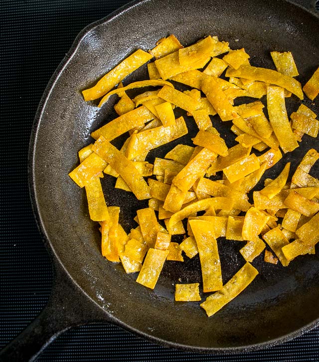 Migas are the perfect Mexican breakfast dish for lazy weekend mornings. We're topping this version with a freshly made Salsa Verde and it is delicious! mexicanplease.com 