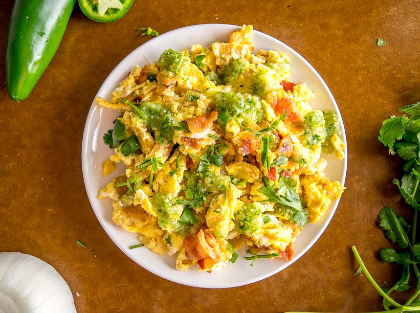 Migas are the perfect Mexican breakfast dish for lazy weekend mornings. We're topping this version with a freshly made Salsa Verde and it is delicious! mexicanplease.com 