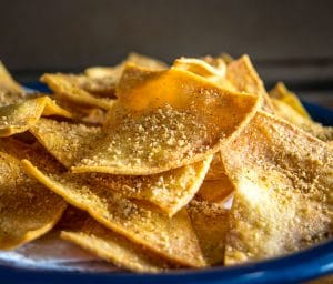 This is the easiest way to make a batch of Baked Tortilla Chips. I like them best when the edges are crispy but the middle is still slightly chewy, i.e. don't cook them too long! mexicanplease.com