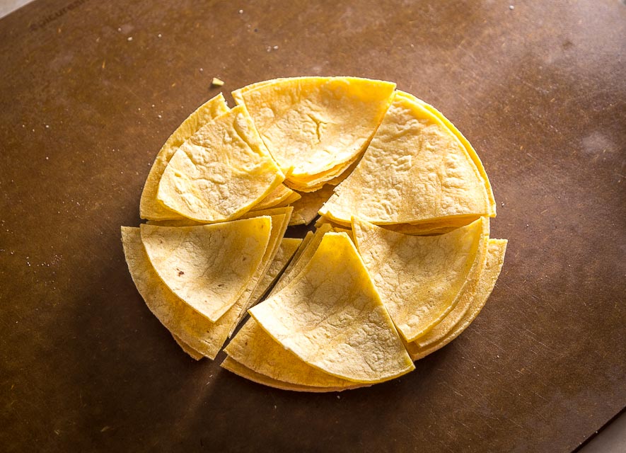 This is the easiest way to make an awesome batch of Baked Tortilla Chips. I like them best when the edges are crispy but the middle is still slightly chewy, i.e. don't cook them too long! mexicanplease.com