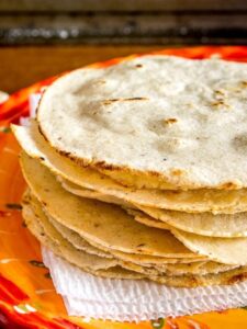 Here's the recipe for a recent batch of homemade corn tortillas I made using some White Olotillo Corn. I used a food processor to grind the corn down and added in some Masa Harina to get the right consistency. mexicanplease.com