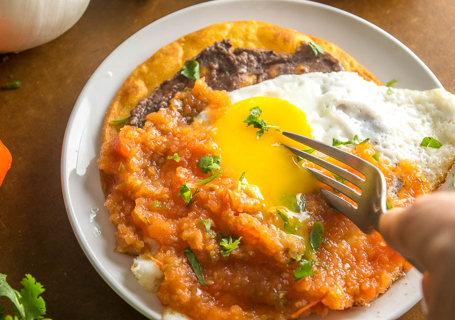 If you have some homemade Salsa on hand then you don't need much else for an authentic batch of Huevos Rancheros. We're adding some freshly made refried beans to this batch -- so good! mexicanplease.com