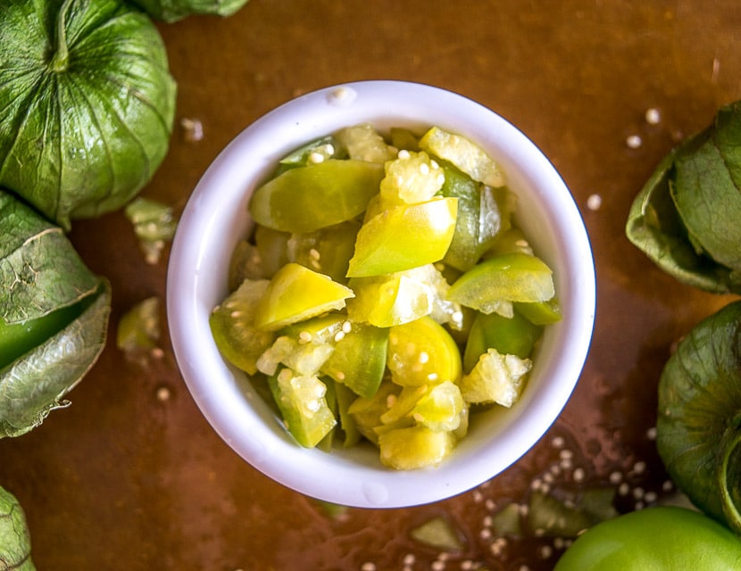 These Pickled Tomatillos will give you a tart burst of acidity and they work wonders on tacos, quesadillas, and even sandwiches. So good! mexicanplease.com