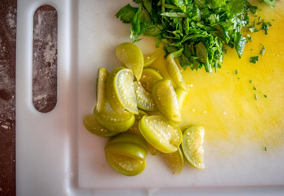 This is my new favorite pizza! The pickled tomatillos pair well with the chorizo and we're using a garlic oil layer as the sauce -- so good! mexicanplease.com