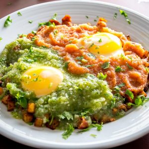 This classic Mexican breakfast dish is served with two freshly made Salsas -- yes, two! I use a bottom layer of potatoes and chorizo, but corn tortillas are also a good option. mexicanplease.com
