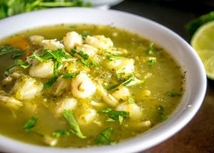 Dipping quesadilla into Pozole.