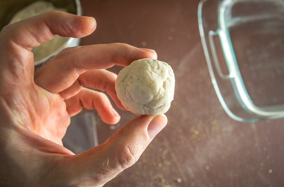 Single ounce golfball sized round of masa dough. 