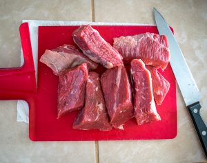 Trimming beef brisket for Mexican Shredded Beef.