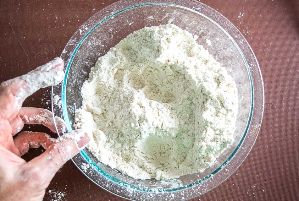 Crumbling fat into flour for tortillas