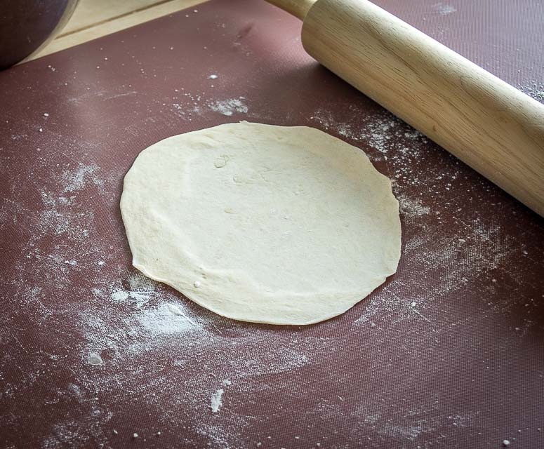 Dough ball after being rolled out. 