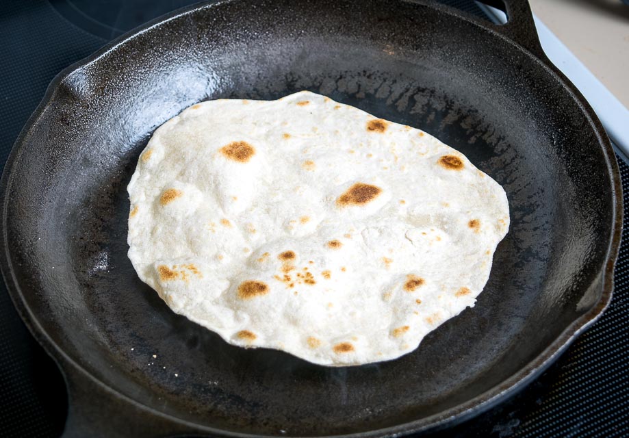 Light brown spots on homemade flour tortilla.