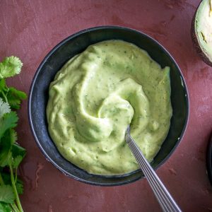 Avocado Salsa being served at the table.