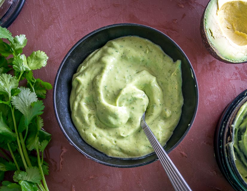 Avocado Salsa being served at the table.