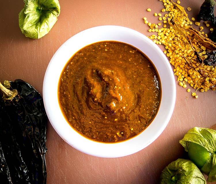 This is a great Salsa to get you familiar with the flavor of Pasilla Chiles -- earthy, fruity, with mild heat. But don't confuse them with Anchos! mexicanplease.com