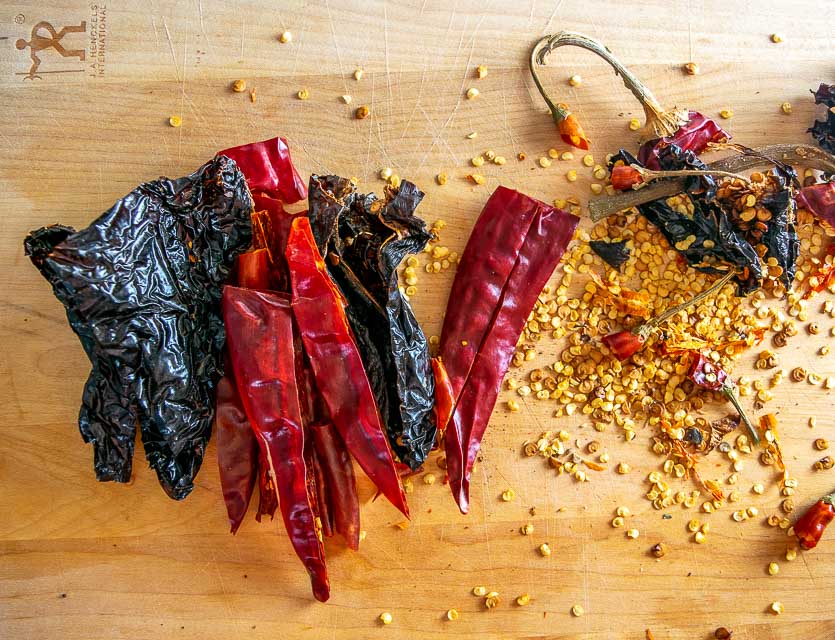 De-stemming and de-seeding Ancho and Guajillo dried chilis