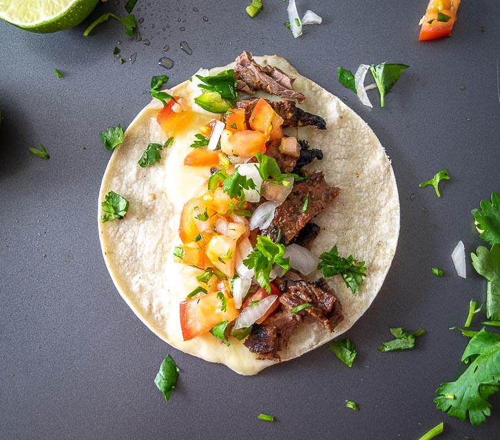 Serving Carne Asada Tacos with Pico de Gallo