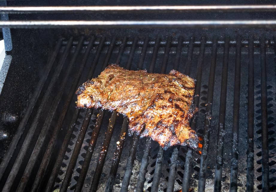 Charring skirt steak for Carne Asada Tacos