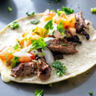 This recipe is designed to get some Carne Asada Tacos in the house -- tonight! Serve them up with some freshly chopped Pico de Gallo and you'll have some happy faces at the dinner table! mexicanplease.com