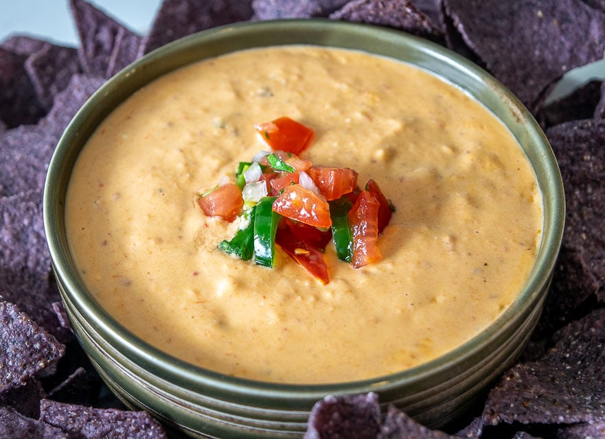 Such an easy Queso recipe! Tons of flavor from the smoky, fiery chipotles but you can always dial back on them for a milder version. mexicanplease.com