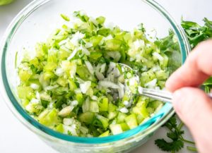 This Tomatillo Pico de Gallo wants to be in your kitchen! Lately I use it for quesadillas and it's always a hit. mexicanplease.com