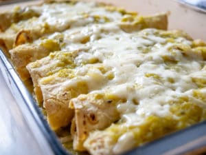 This is a wicked easy recipe for a savory batch of Hatch Green Chile Enchiladas. Be sure to roast those chiles as that is the key! mexicanplease.com