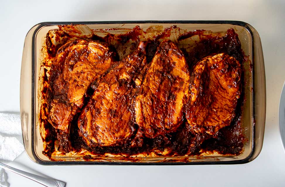 Pork chops marinating in adobo sauce