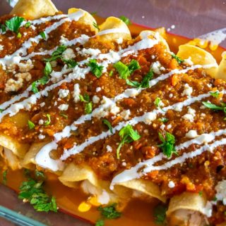 Here's an easy recipe for a wicked batch of Chicken Tinga Enchiladas -- be sure to add tomatillos to the Tinga sauce as it makes a huge difference! mexicanplease.com