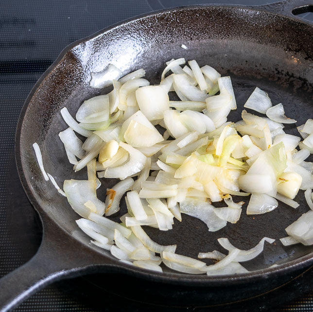 Saute onion and garlic for Entomatadas