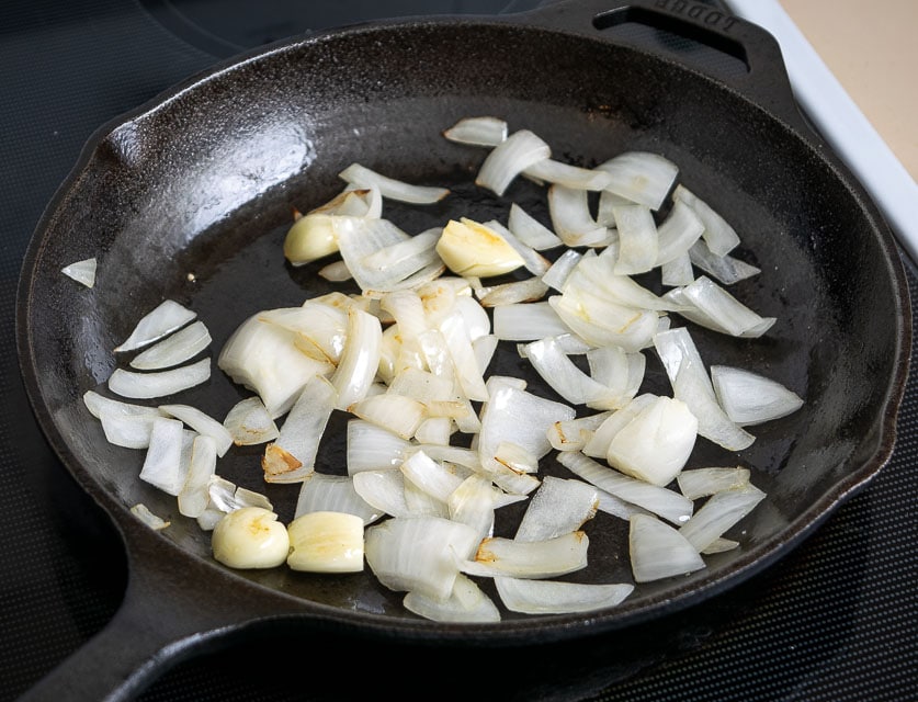 Saute onion and garlic for Tinga de Pollo