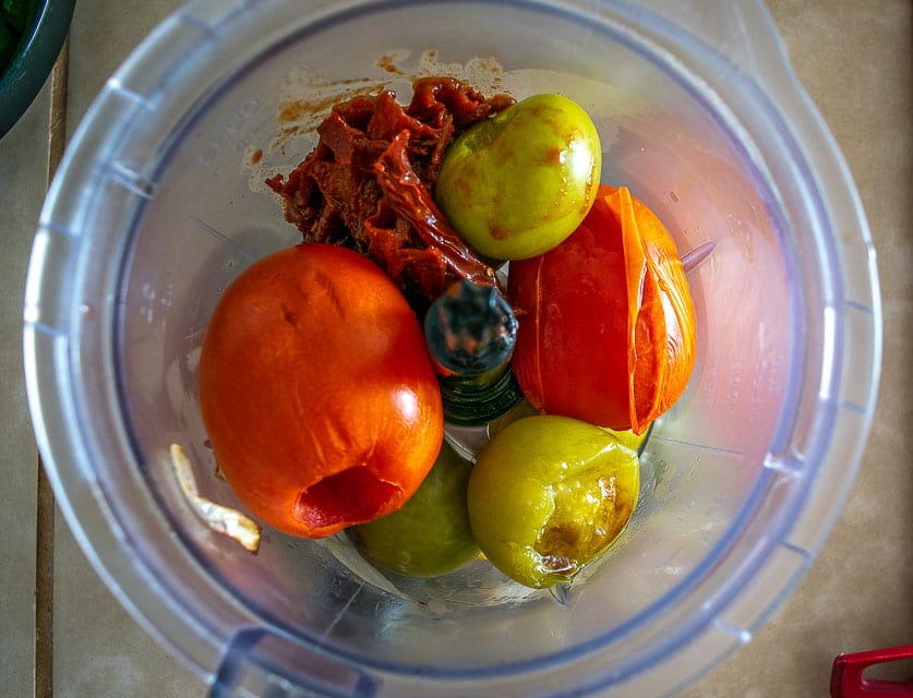 Blending ingredients for Tinga sauce