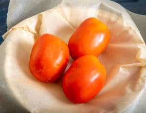 Tomatoes roasting for Calabacitas