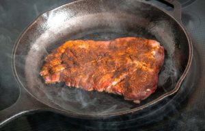 Cooking skirt steak in a cast iron skillet
